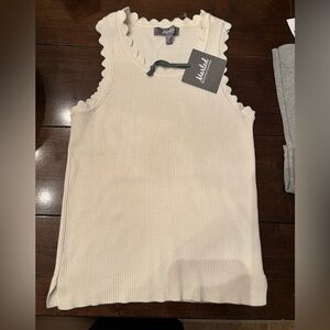 Very lightweight sweater tank with scalp neck, and arms